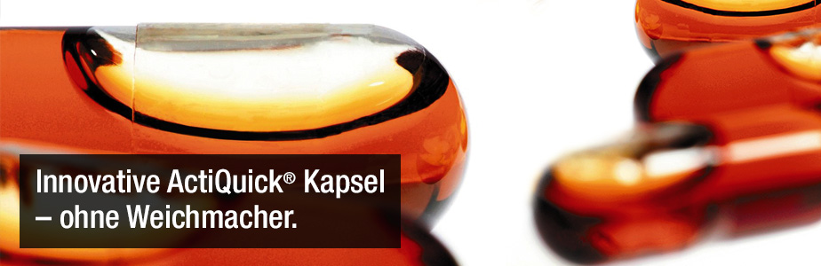 Vier rote Kapseln auf weißen Hintergrund mit dem Titel: Innovative ActiQuick Kapsel – ohne Weichmacher